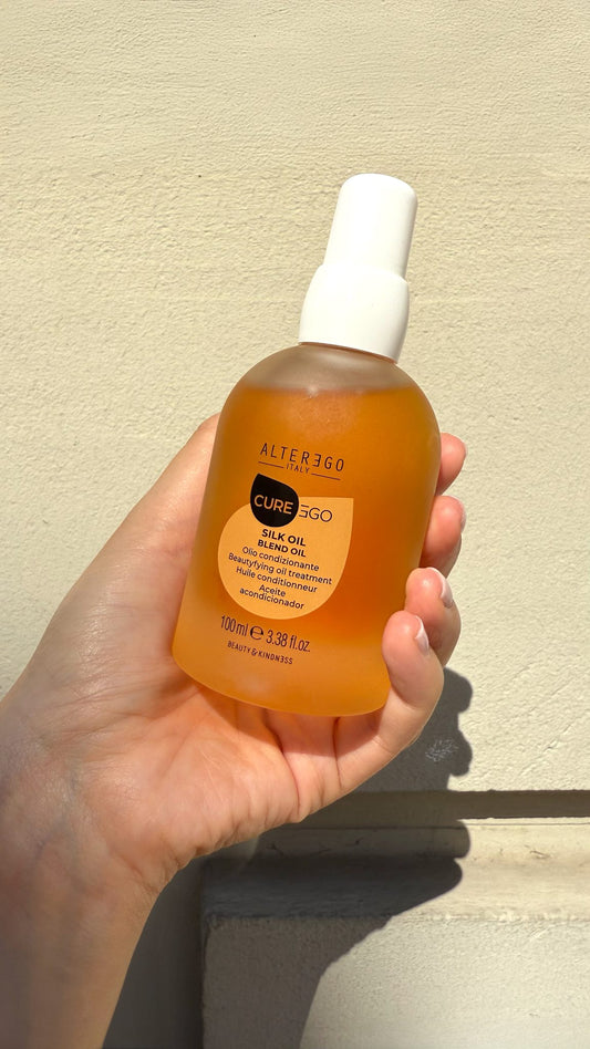 CurEgo Silk Oil Blend Oil 100ml bottle closeup — beautifying conditioning oil treatment by Alter Ego Italy